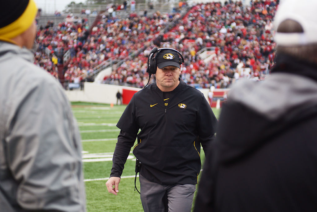 Barry Odom on the field